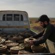 Photo of a Syrian soldier clearing landmines in Idlib province.